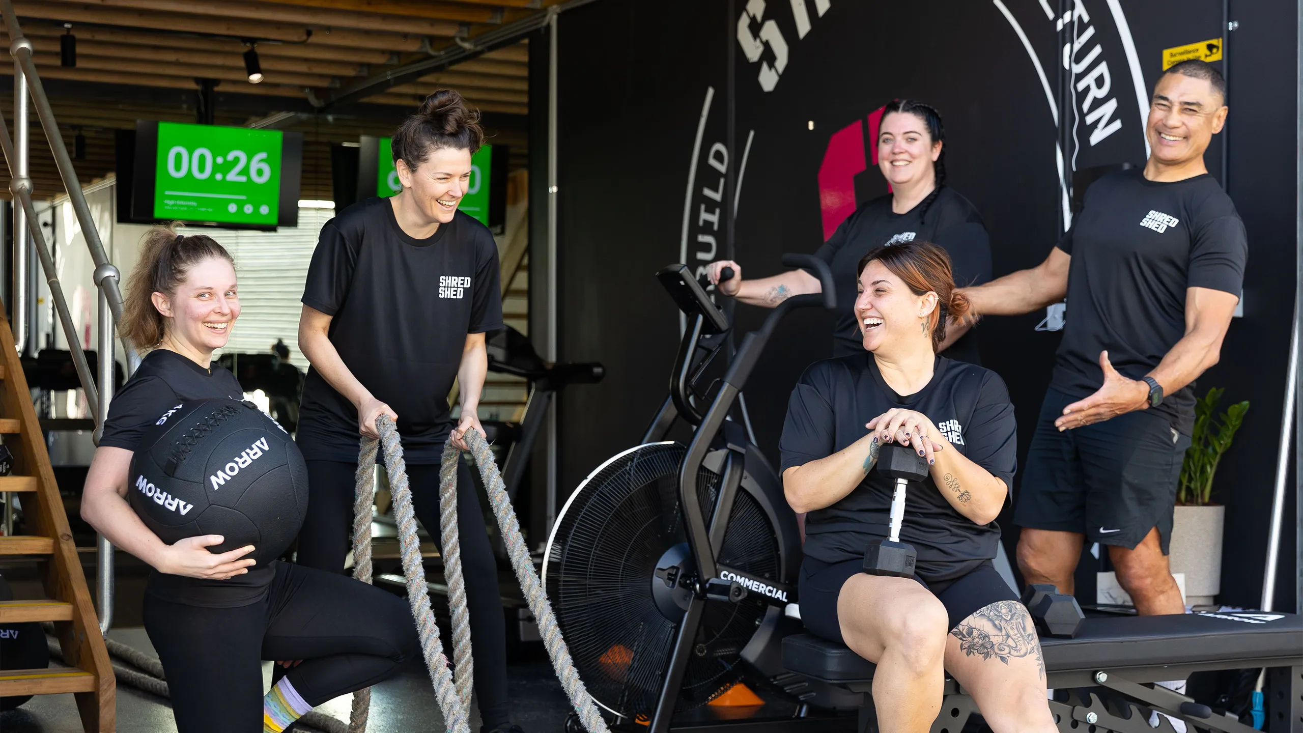 Shred Shed Group image of people smiling inside Shred Shed